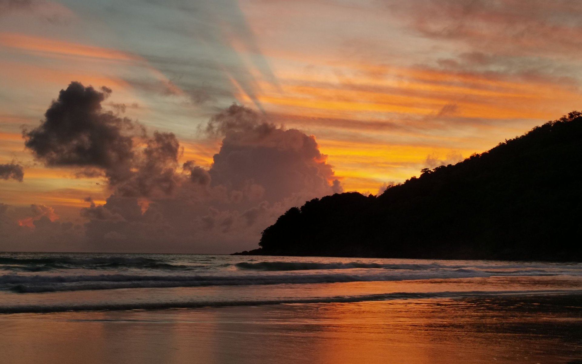 Golden sunset over a Phuket beach, the after-beach hour before dinner at Bisou in Cherngtalay